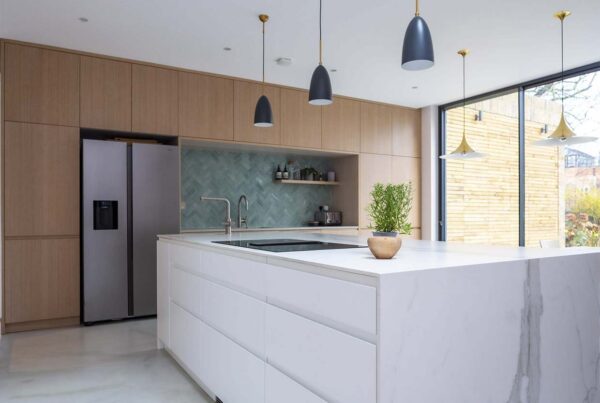 Image of a marble bespoke kitchen in London with an Island
