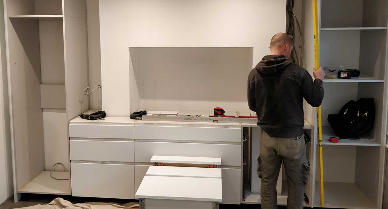 Image of a bespoke kitchen in London being fitted by Lazfurniture